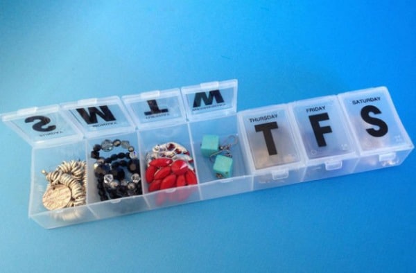 pack jewelry in pill organizer