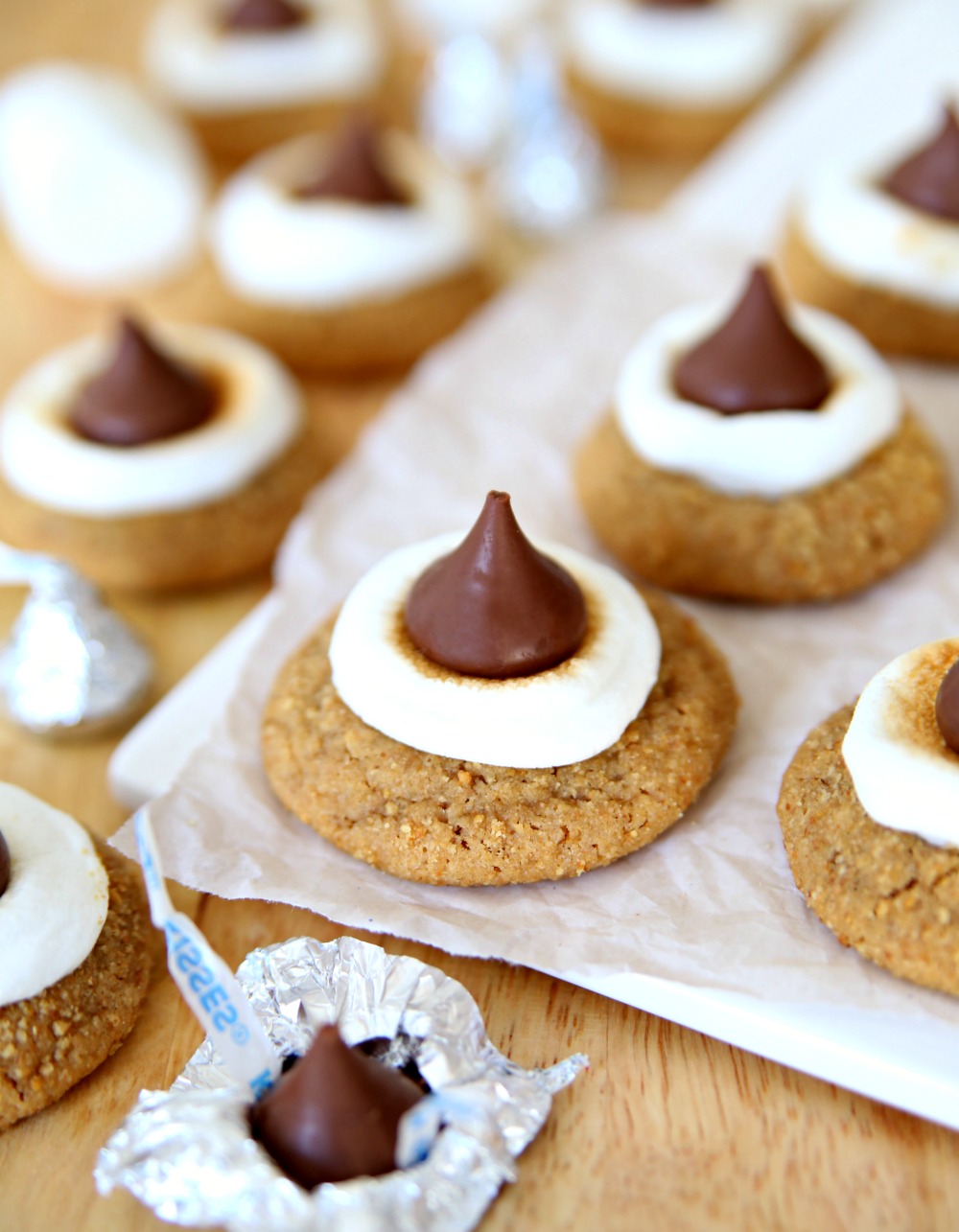 S'mores Blossom Cookies - Graham Cracker Cookies with Hershey Kisses and Marshmallows.