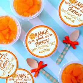 Orange You Glad We're Friends Valentine's Day Free Printable taped to mandarin orange cups