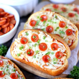 Garlic Bread Pizza - Turn garlic bread into delicious personal pizzas with this easy recipe