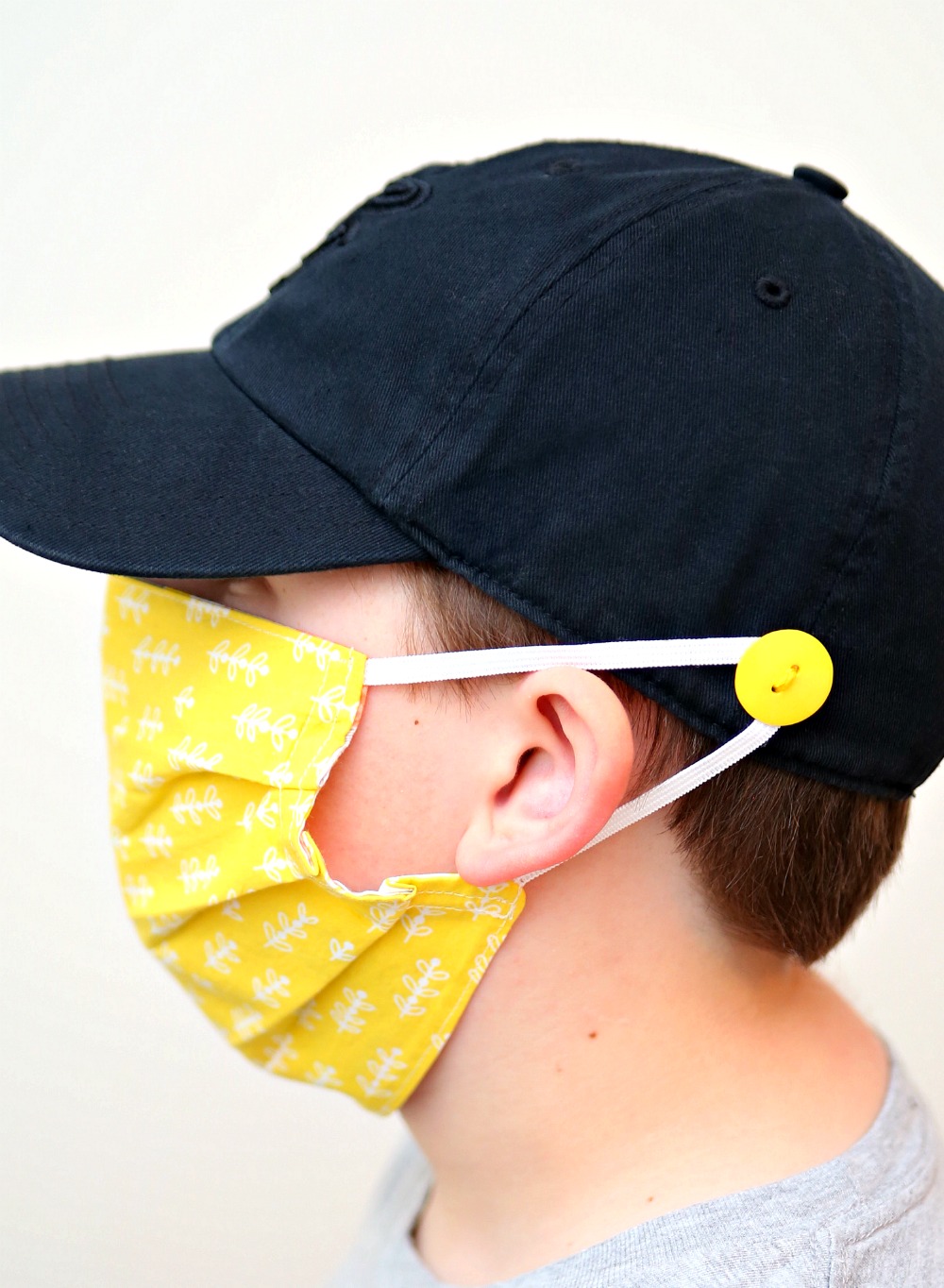 Add buttons to your hat for an easy ear saver