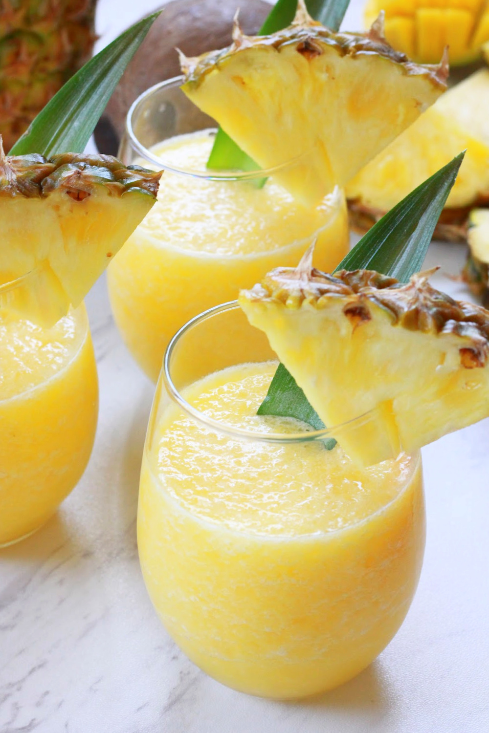 These Tropical Wine Slushies are refreshing and delicious making them the perfect summer cocktail recipe!  