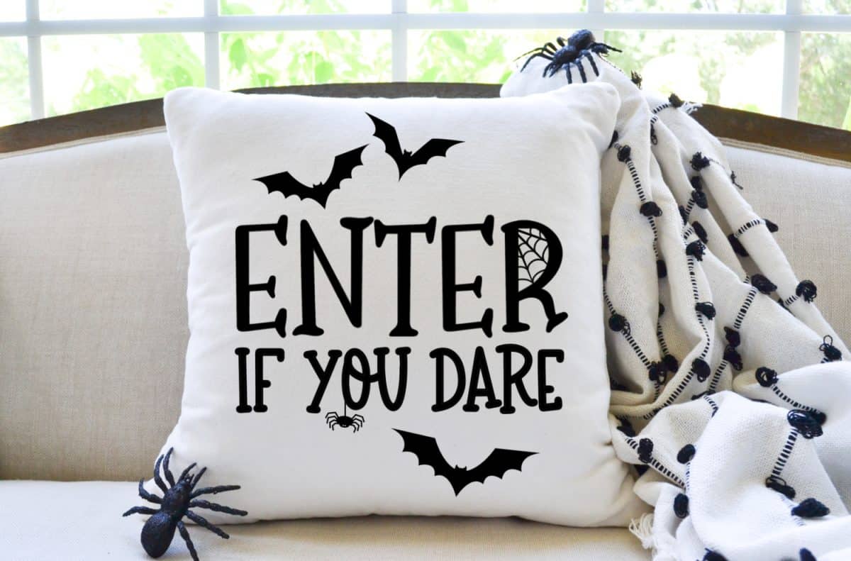 Enter If You Dare SVG on white pillow