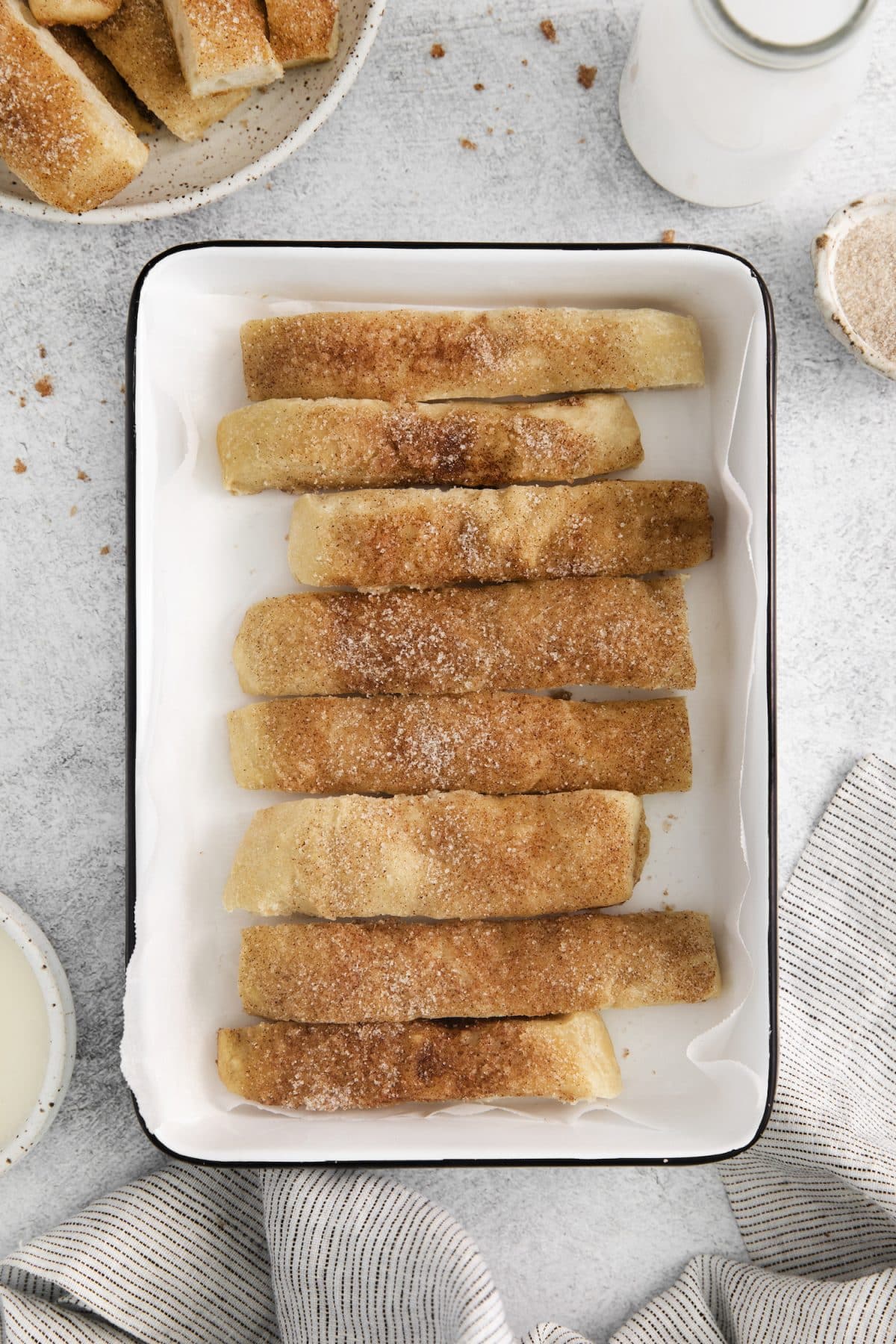 Easy Cinnamon Breadsticks in white pan