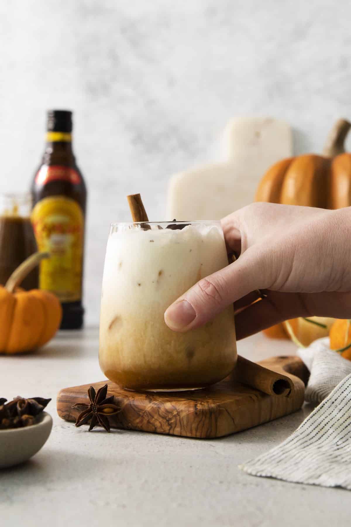 Holding a Pumpkin Spice White Russian in Hand