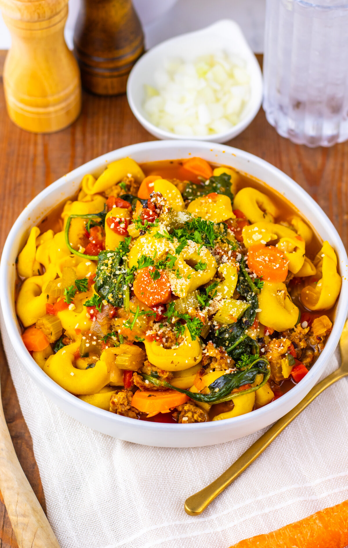 Cozy bowl of tortellini soup perfect for a chilly fall or winter night.