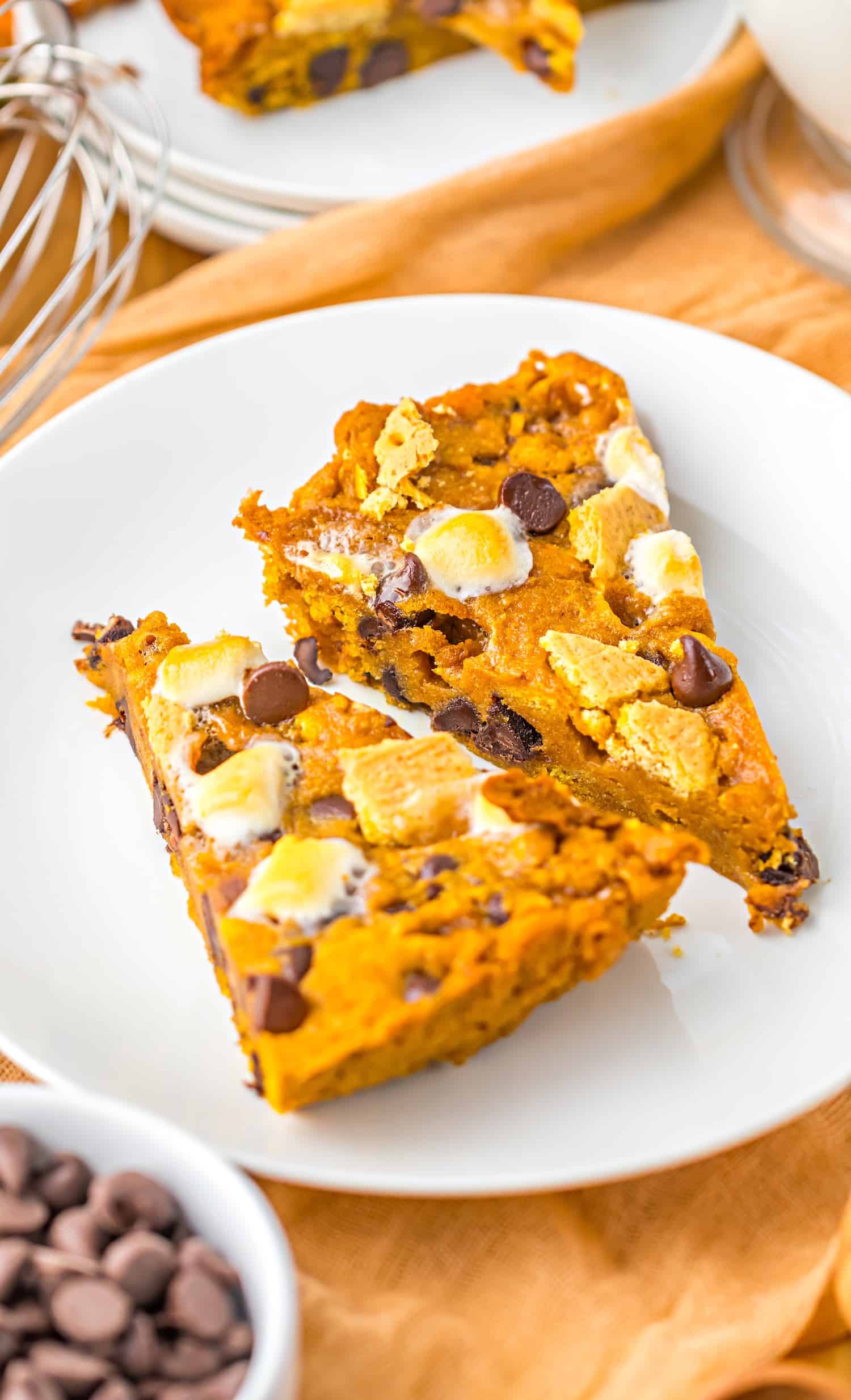 Close-up of Pumpkin S’mores Cookie Cake on a white plate